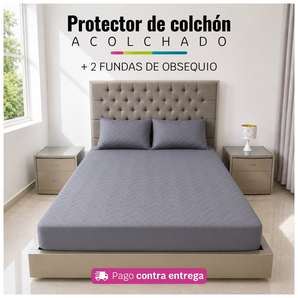 Referencia visual de un protector acolchado color gris claro con dos fundas de almohada; el diseño del acolchado puede variar